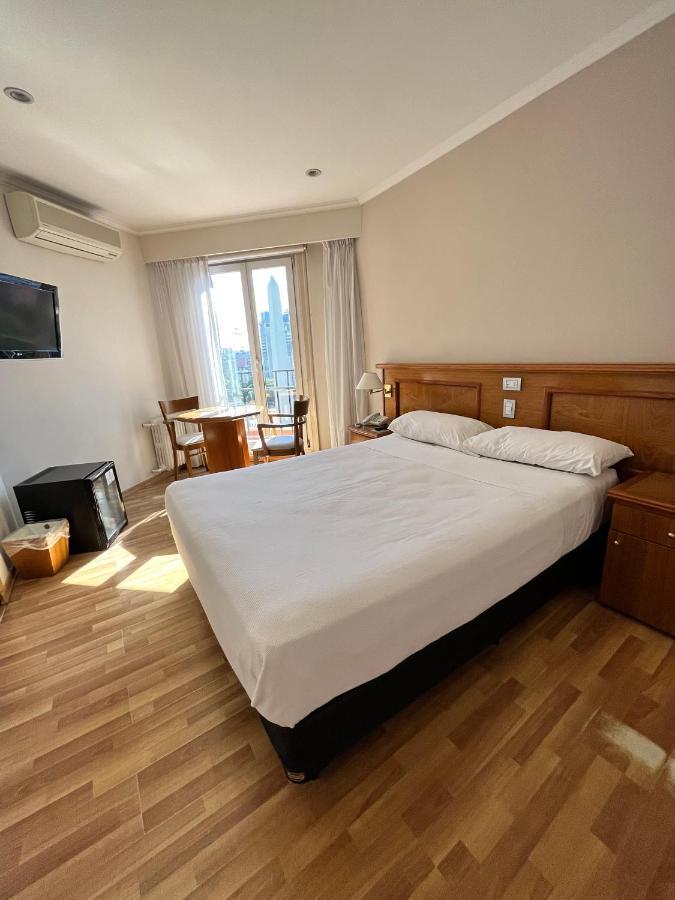 HABITACIÓN ESTANDAR CAMA GRANDE VISTA CIUDAD,1232578121:JPEG