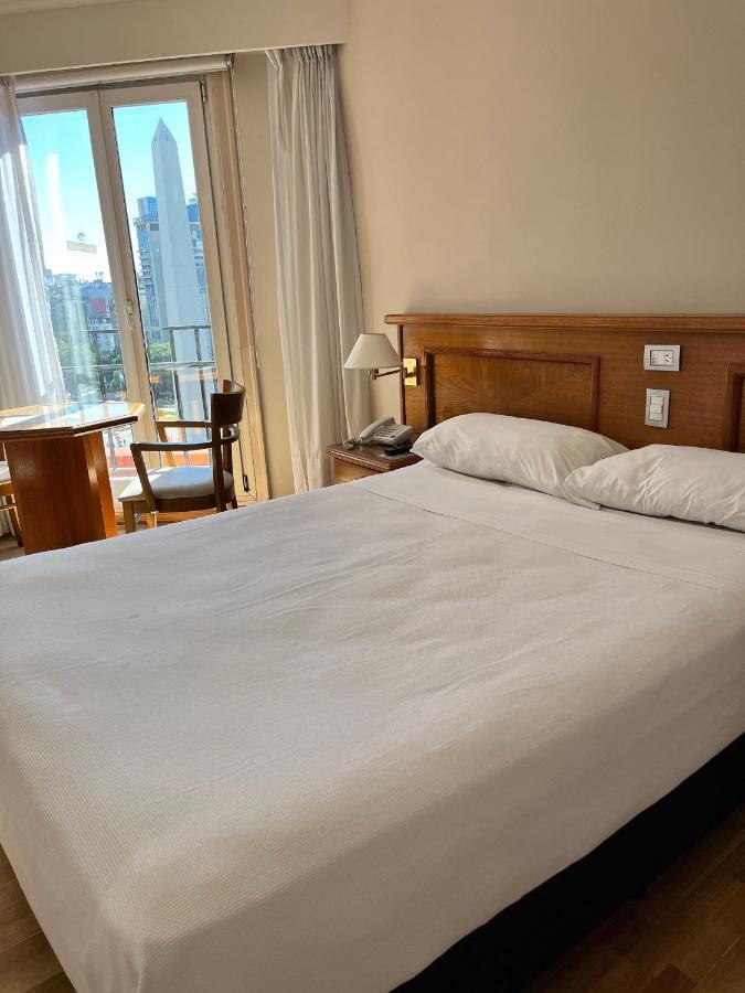 HABITACIÓN ESTANDAR CAMA GRANDE VISTA CIUDAD